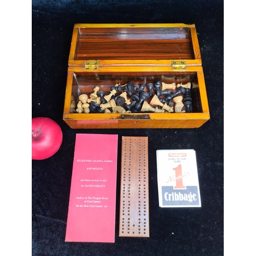 213 - A vintage cribbage game set housed in a neat wood hand crafted box.