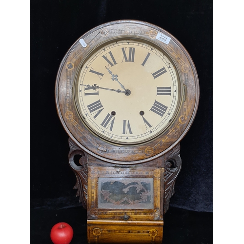 223 - A superb antique inlaid drop wall clock complete with key and pendulum. Original distributors sticke... 