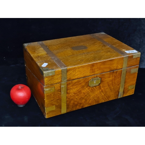 232 - A gorgeous antique mahogany storage box featuring brass hardware and engraved escutcheon.