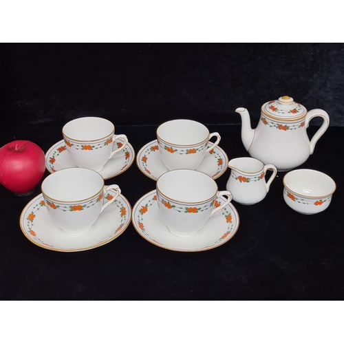 233 - A very pretty and delicate vintage Royal Doulton tea service comprising of cups, saucers, milk jug a... 