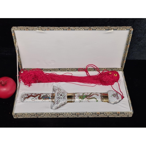 253 - A vintage enameled Japanese telescopic Tai Chi sword, similar online for €137.00.