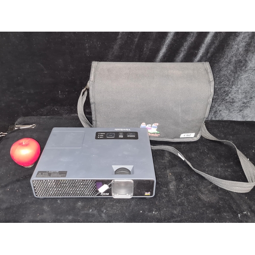 263 - A high quality View Sonic PJ358 portable projector. Fully complete with cables, manual and nylon tra... 