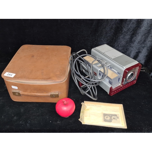 264 - A vintage Kindermann Junior 150 Projector complete in original tan hard shell travel case and with o... 