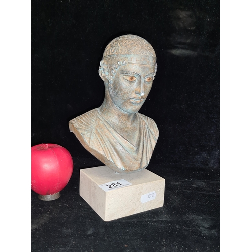 281 - A wonderful bronzed effect bust of Delphi mounted on a marble plinth base.