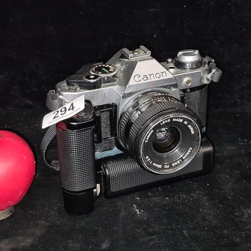 295 - Star Lot : A Canon AE-1 Program 35mm SLR film camera with Canon lens FD 28mm 1:2.8 and autowinder. R... 