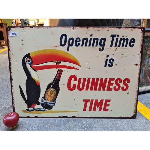 356 - A large metal Guinness advertising pub sign depicting the iconic toucan. 