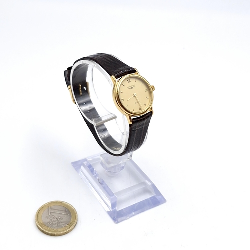 403 - Star lot : A Swiss made ladies Longines quartz wrist watch with original leather strap. Watch number... 