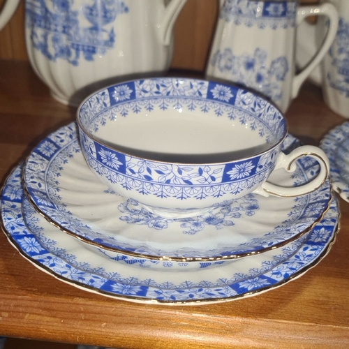 699 - Bavarian porcelain tea set by Seltmann Weiden features a blue floral pattern, West Germany. The set ... 