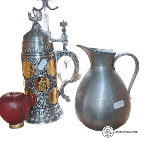 703 - Kaiserhumpen German pewter stein, featuring gold-tone medallions and elaborate handles. Includes a 1... 