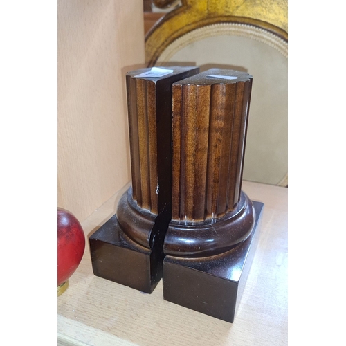 705 - Pair of column bookends by The Bombay Company, crafted in rich mahogany.