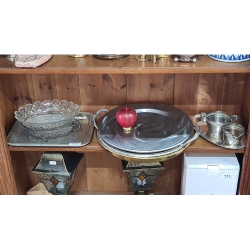 712 - Ornate cut glass bowl with intricate floral Epns base, 5 trays inc Epns and a handsome Milk and suga... 