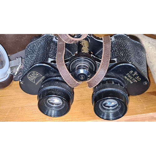 717 - Vintage AXAP Dublin binoculars with leather case, 8x30 magnification, 7.5° field. Includes vintage a... 