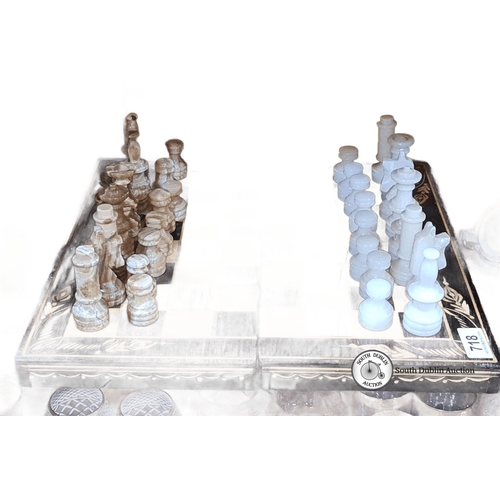 718 - A super complete marble  chess set with pieces in contrasting brown and white hues. Wooden board wit... 