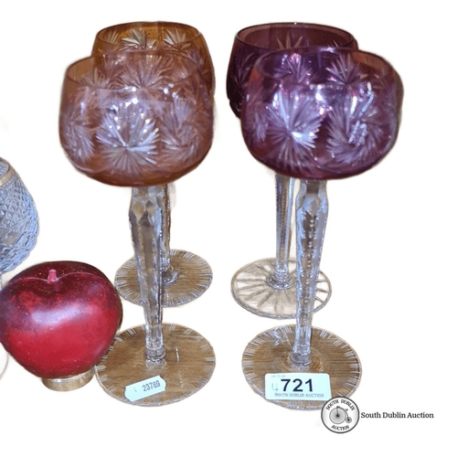 721 - Set of four cut glass goblets with intricately etched starburst design in varying shades of pink and... 