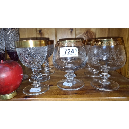 724 - Set of crystal glassware 4 goblets and 6 brand balloons with gold-tone rims, featuring intricate etc... 