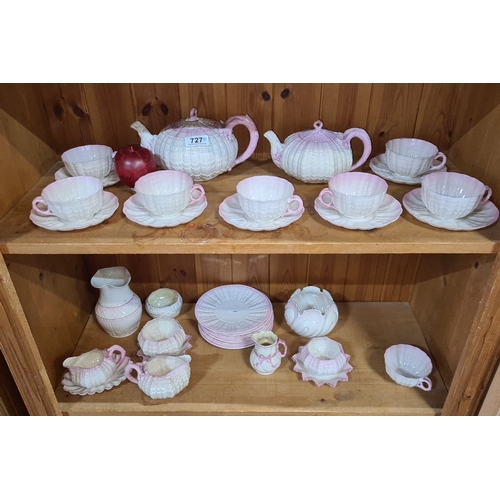 727 - Super Star Lot :A fabulous early Belleek shell-pattern porcelain tea set, featuring two teapot, six ...