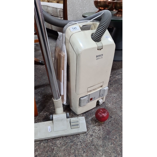 741 - Bosch Optima 55 vacuum cleaner with hose and attachments and additional bags . Classic design. High ... 