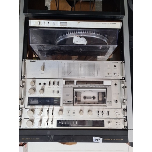 744 - Vintage Sanyo Plus Series stereo system with Audio Rack, turntable, and speakers. Includes Wharfdale... 