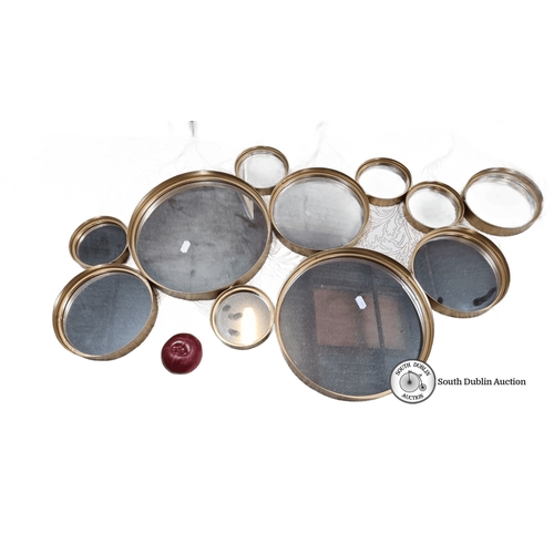 750 - Set of ten vintage brass-framed circular sieves of various sizes with mesh surfaces.