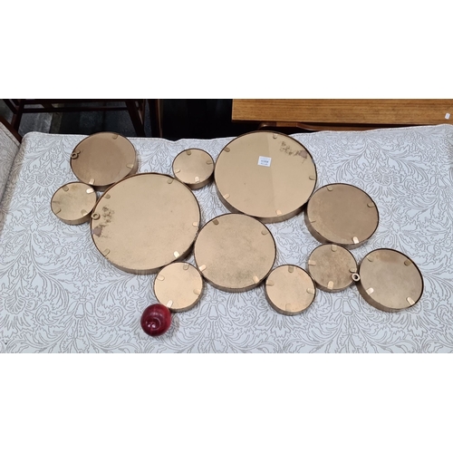 750 - Set of ten vintage brass-framed circular sieves of various sizes with mesh surfaces.