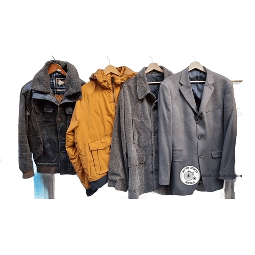 576 - Collection of four jackets, featuring brands like Mantaray. Includes leather, wool blend, and padded... 