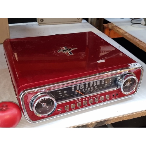 581 - A very cool  Ford Mustang stereo with radio and record player with the iconic Mustang logo.