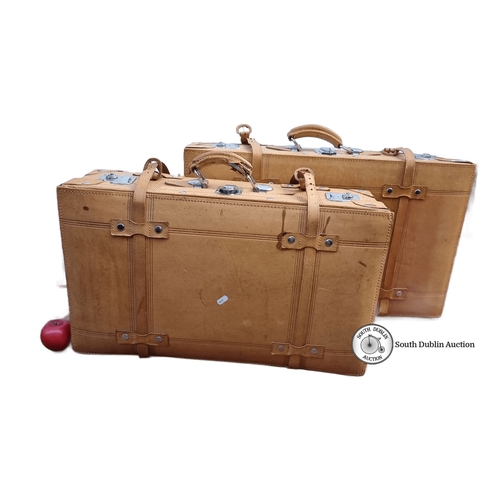 586 - Pair of vintage leather suitcases with metal hardware and black interior lining. Very clean interior... 