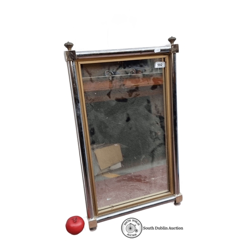 592 - Rectangular wall mirror with brass and chrome tubular frame, featuring acorn finials. Back secured w... 