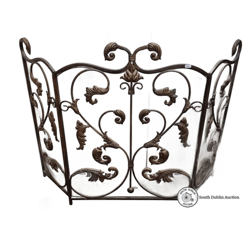 595 - A very attractive Ornate wrought iron fire screen with decorative scrollwork design, featuring three... 