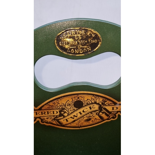 604 - Green lacquered wood magazine holder with decorative print from Selby & Co., London. Accompanied by ... 