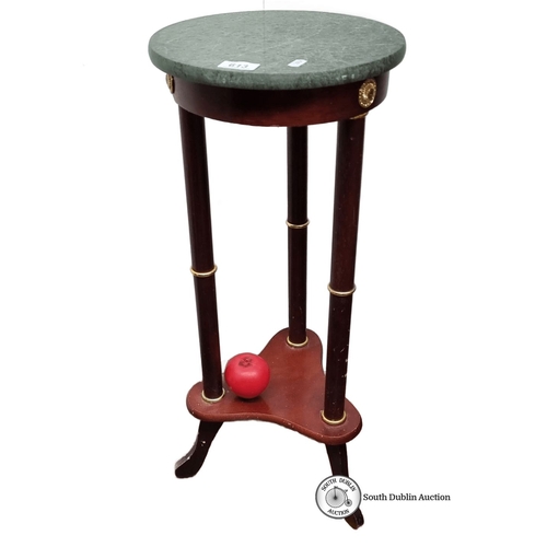 613 - Antique marble-top plant stand with mahogany base and gilt brass accents from the early 20th century... 