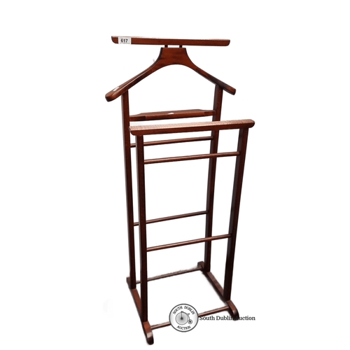 617 - Mahogany valet stand, mid-century modern style, features a hanger and tiered racks.