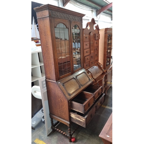 619 - Antique oak secretary bookcase with leaded glass doors, drop-front desk with tooled leather interior... 