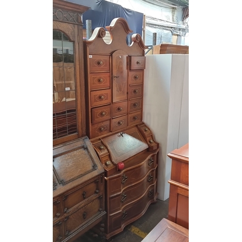 620 - Star Lot : A very handsome Mahogany Georgian-style bureau bookcase with scrolled pediment and multip... 