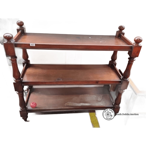 623 - Three-tier antique mahogany dumb waiter  with turned legs and casters. Victorian period design.