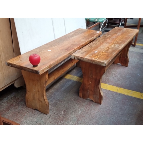 626 - Pair of rustic wooden benches, made from solid pine. They feature a simple, robust design with natur... 