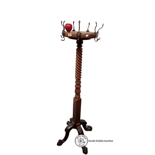 630 - Star Lot : Victorian-style mahogany hat stand features an intricately carved twisted column and bron... 