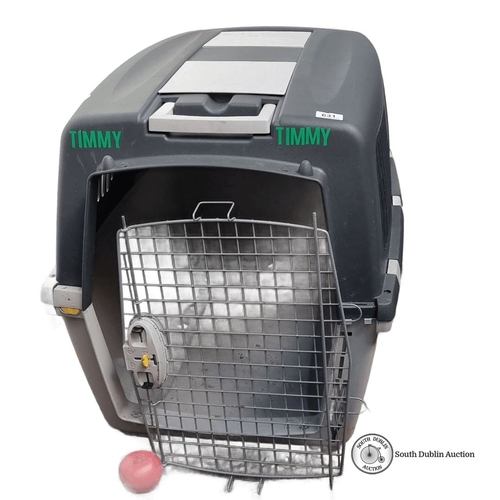 631 - A large Plastic pet crate with attachment latches, features a gray and white design labeled . Includ... 