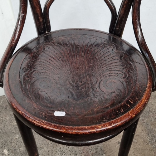 635 - Vintage Fischel bentwood chair, Bohemian origin, featuring intricate wood design. Early 20th century... 