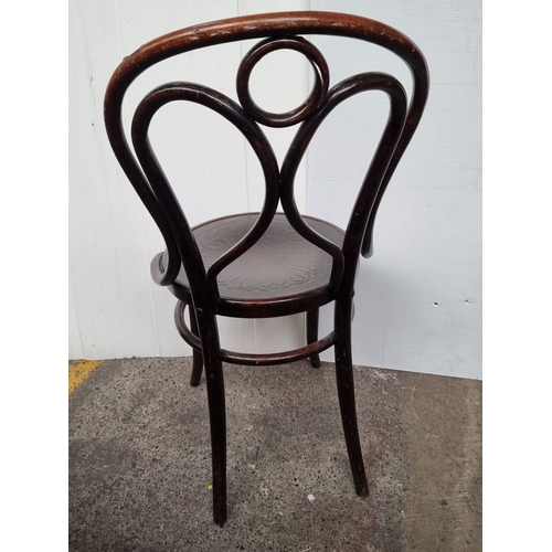 635 - Vintage Fischel bentwood chair, Bohemian origin, featuring intricate wood design. Early 20th century... 