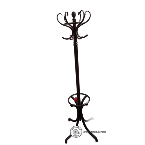 641 - Victorian-style dark wood coat stand with curved hooks and turned finial, featuring a circular base ... 