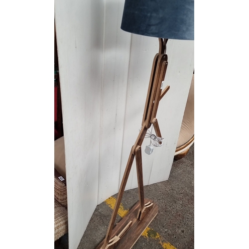 645 - Wooden mannequin-style floor lamp with blue velvet shade and a playful human design . Very cool piec... 