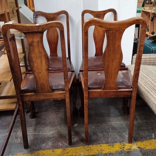 647 - Set of four antique wooden dining chairs with leather seats, featuring elegant cabriole legs. From t... 