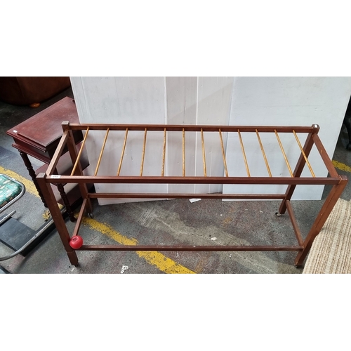 648 - Star Lot : A Fabulous mid century teak  clothes drying rack with slatted design and caster wheels, f... 