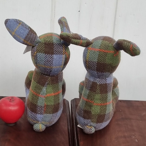 653 - Pair of wool tartan fabric very heavy doorstops in dog and rabbit shapes. Dimensions: 10cm x 20cm x ... 