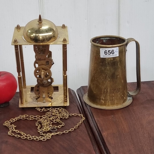 656 - Franz Hermle brass clock mechanism, made in Germany, features visible gears. Includes brass handle m... 