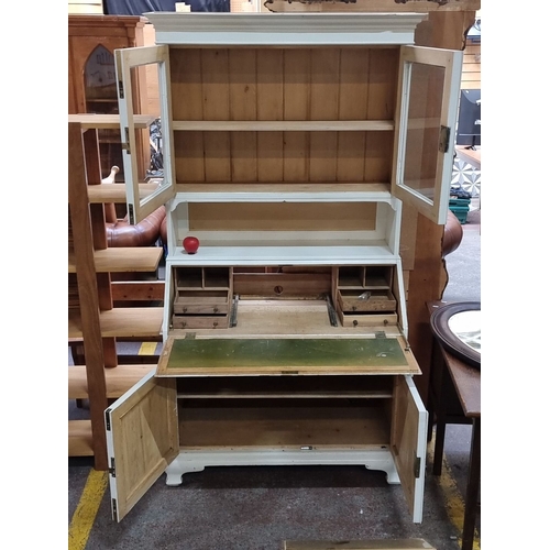 662 - White painted wooden bureau bookcase, featuring glass doors, interior shelves, and a drop-down writi... 