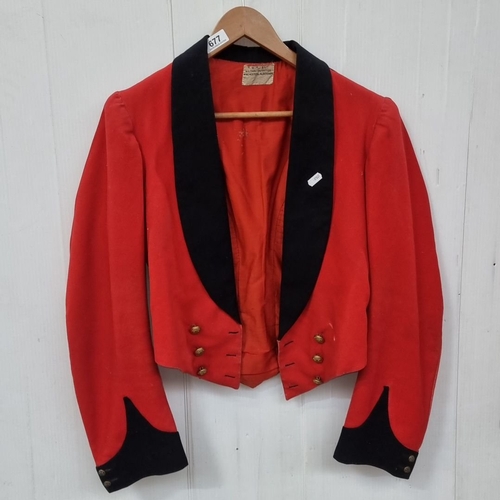 677 - Vintage red Army officers military mess jacket with black velvet trim and gold button accents.