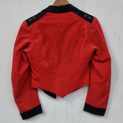 677 - Vintage red Army officers military mess jacket with black velvet trim and gold button accents.