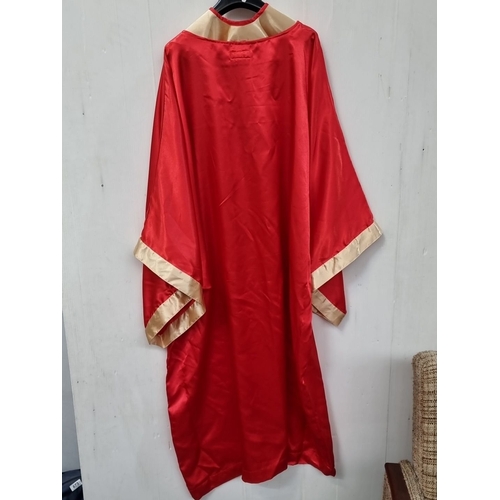 678 - Sable red robe, made in Ireland, size 55, features classic design with contrasting trim. Bit of Sist... 